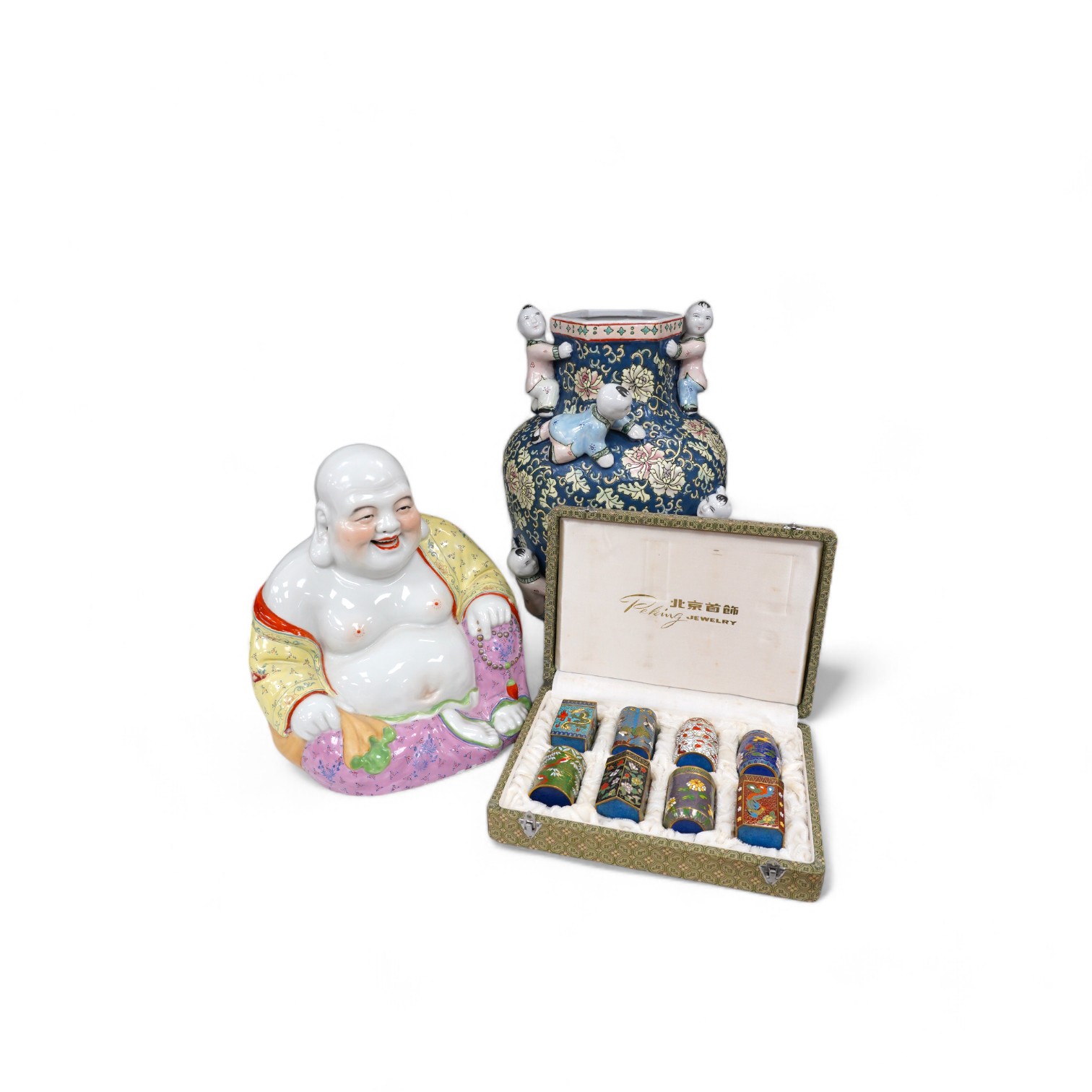 A 20th century Chinese famille rose Buddha, a ‘hundred boys’ vase and a boxed set of cloisonné boxes, vase 34cm. Condition - cloisonné boxes good, Buddha has missing decoration to robe near right hand and vase good